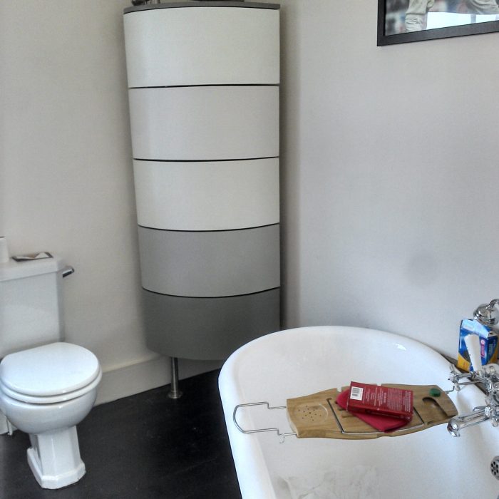 A 5 section rotary bathroom storage unit